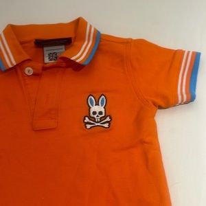 Orange psycho, bunny polo, size 2